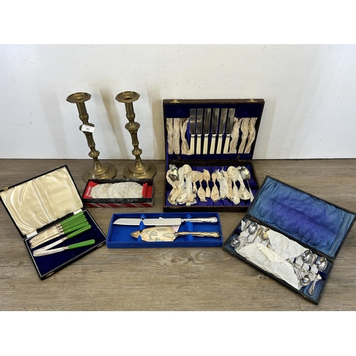 362 - A collection of metalware to include pair of 19th century style brass candlesticks, cased EPNS 12 pi... 