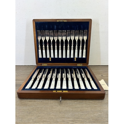 364 - An Allen & Darwin 24 piece canteen of silver plated and mother of pearl handled cutlery - RD no. 221... 