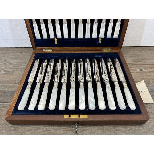 364 - An Allen & Darwin 24 piece canteen of silver plated and mother of pearl handled cutlery - RD no. 221... 