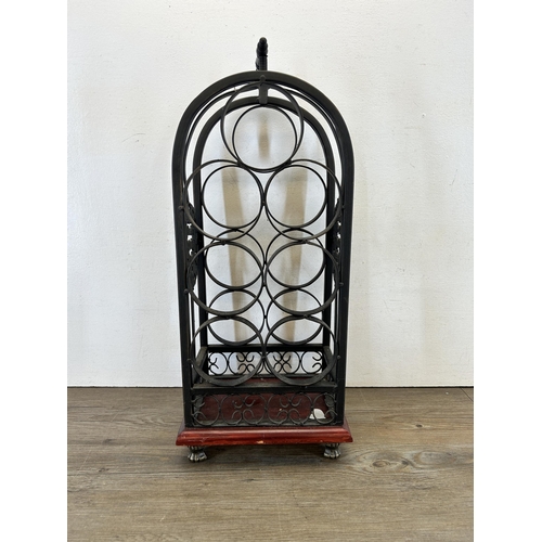 367 - A 19th century style wrought iron seven section bottle holder - approx. 59cm high