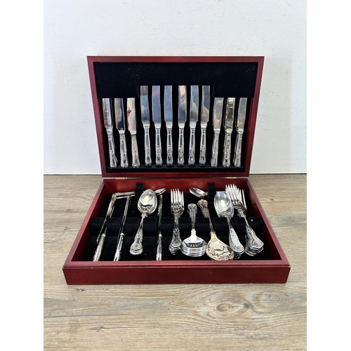 369 - A canteen of King's pattern cutlery to include Arthur Price, AD etc.