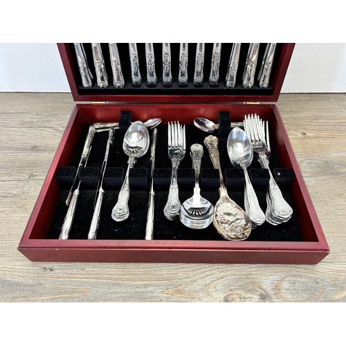 369 - A canteen of King's pattern cutlery to include Arthur Price, AD etc.