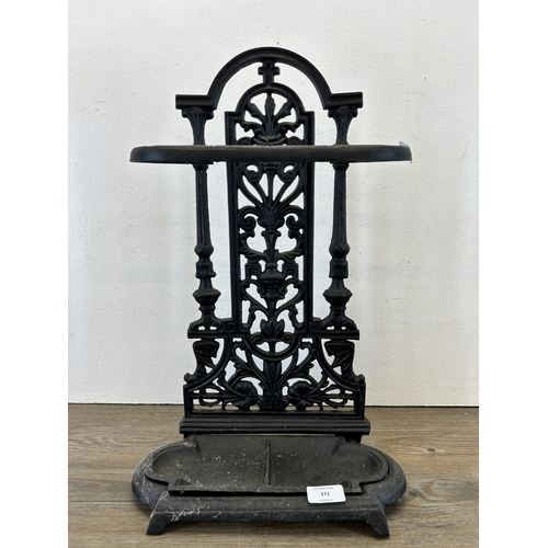 371 - A Coalbrookdale style cast iron stick stand - approx. 52cm high