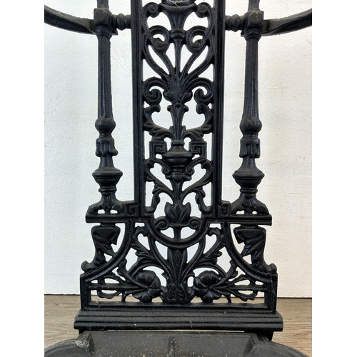 371 - A Coalbrookdale style cast iron stick stand - approx. 52cm high