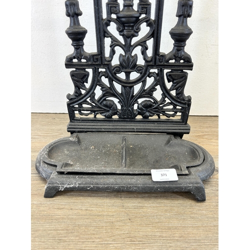 371 - A Coalbrookdale style cast iron stick stand - approx. 52cm high