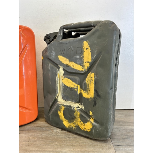 380 - Two metal jerry cans, one World War II military issued and one Saxon