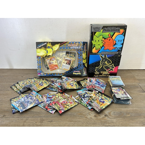 383 - A collection of Pokémon cards to include Crown Zenith, Regieleki V collection, Crown Zenith Elite tr... 