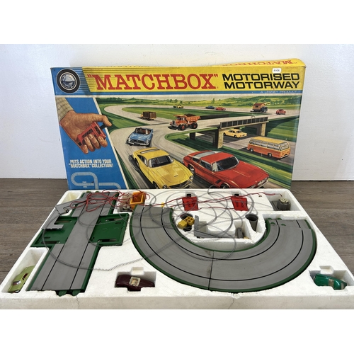 390 - Two vintage boxed Matchbox playsets, one Superfast track.600 double booster racing circuit and one m... 