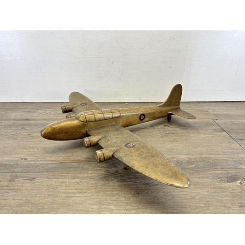 394 - A vintage hand made wooden B-17 model aircraft