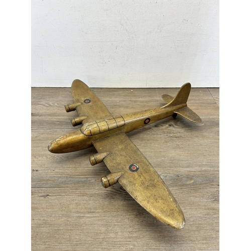 394 - A vintage hand made wooden B-17 model aircraft