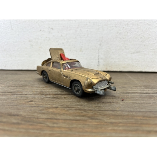 397 - Five vintage die-cast model vehicles, Corgi the Green Hornet's Black Beauty, Corgi Chitty Chitty Ban... 