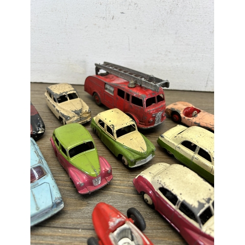 398 - Sixteen vintage die-cast model vehicles to include Hillman Husky, Dingy Supertoys fire engine, Corgi... 