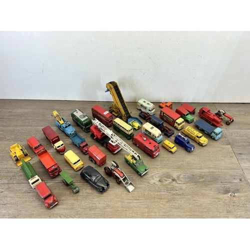 400 - A large collection of vintage die-cast model vehicles to include Corgi Land Rover, Dinky Dunlop doub... 