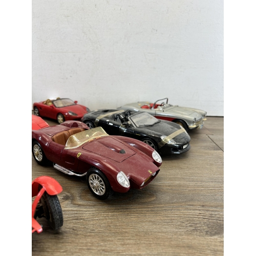 402 - Eight model vehicles to include boxed Autocalia Jaguar E Coupe, Burago Ferrari Testarossa, Burago Al... 