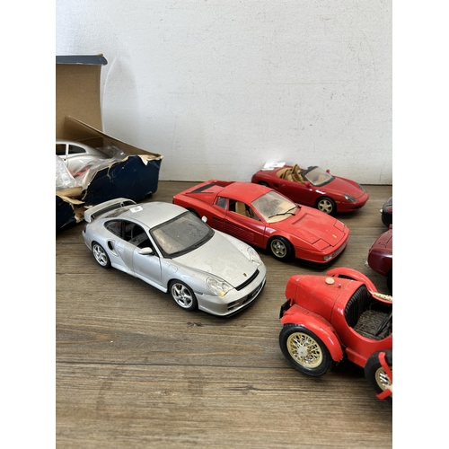 402 - Eight model vehicles to include boxed Autocalia Jaguar E Coupe, Burago Ferrari Testarossa, Burago Al... 