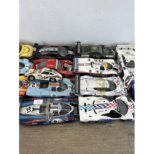 403 - A large collection of die-cast model vehicles to include Autoart 1-18 Porsche 917L, Hall's Madd art ... 