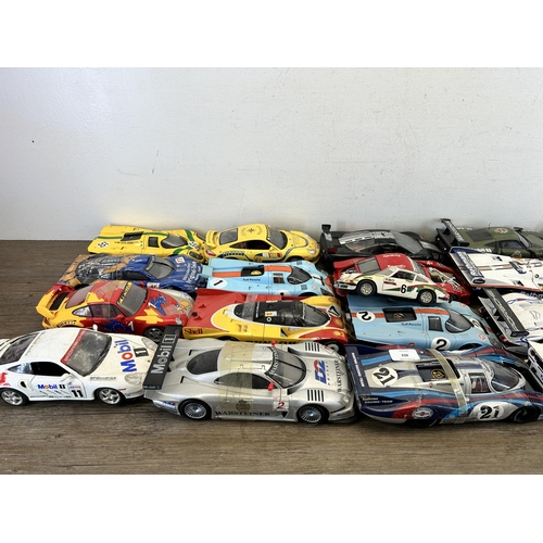 403 - A large collection of die-cast model vehicles to include Autoart 1-18 Porsche 917L, Hall's Madd art ... 