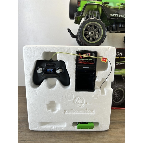 408 - A boxed New Bright Jeep Wrangler full function radio control lithium car with controller, battery an... 