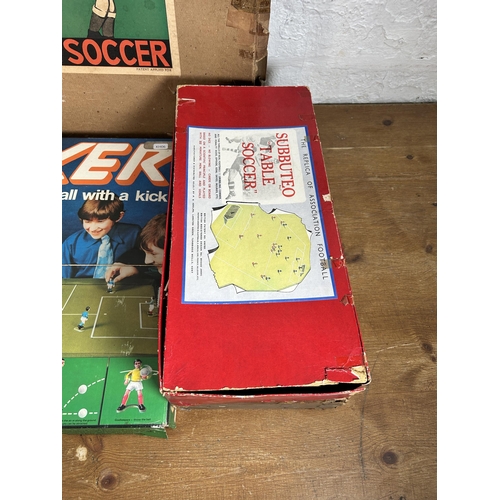 410 - Four vintage boxed board games, P. A. Adolph Subbuteo table football, Parker Striker 5-A-Side, Balyn... 