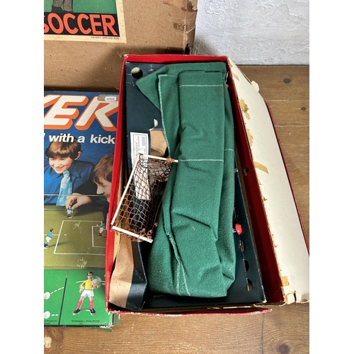 410 - Four vintage boxed board games, P. A. Adolph Subbuteo table football, Parker Striker 5-A-Side, Balyn... 