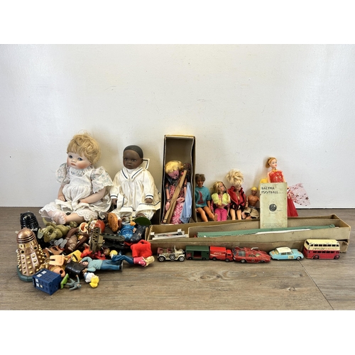 412 - A collection of vintage toys to include boxed Pelham Puppets Marlborough Wilts Marionette, Barbie do... 