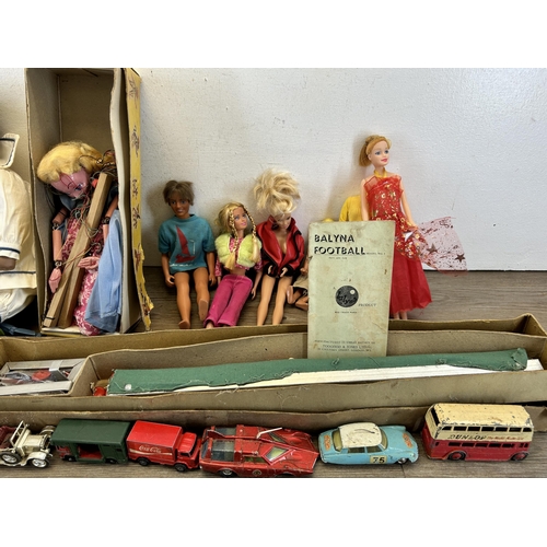 412 - A collection of vintage toys to include boxed Pelham Puppets Marlborough Wilts Marionette, Barbie do... 