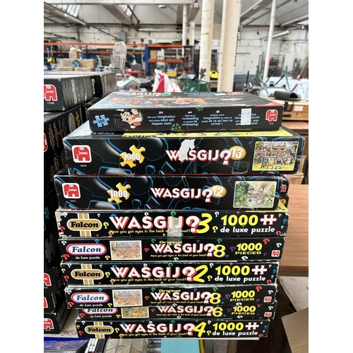 414 - A very large collection of Wasgij? jigsaw puzzles