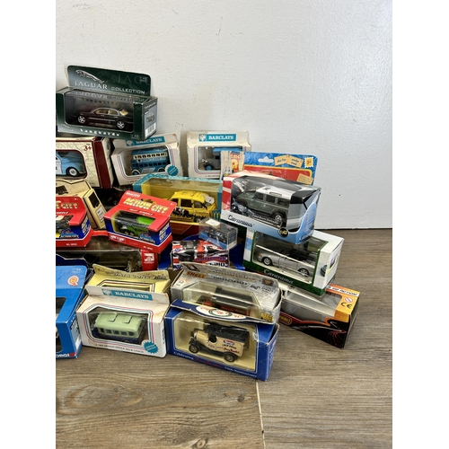 419 - A large collection of mainly boxed die-cast model vehicles to include Corgi Classic vehicles, Gate L... 