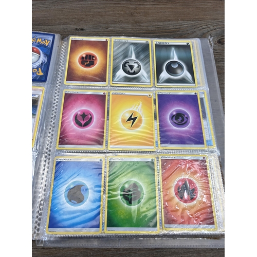 423 - A large collection of Pokémon trading cards to include two Jumbo cards, GX, EX and V cards, various ... 