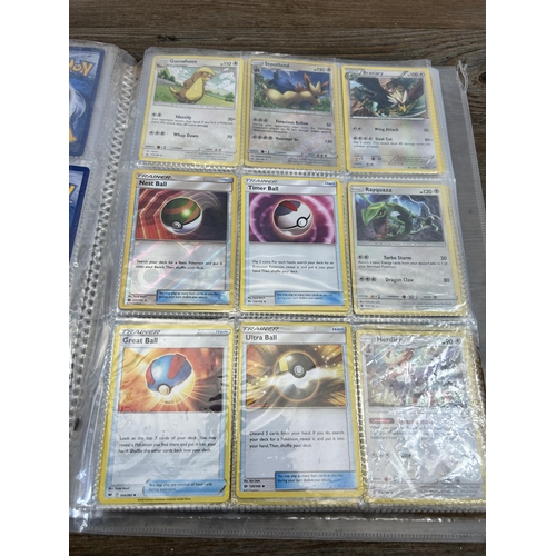 423 - A large collection of Pokémon trading cards to include two Jumbo cards, GX, EX and V cards, various ... 