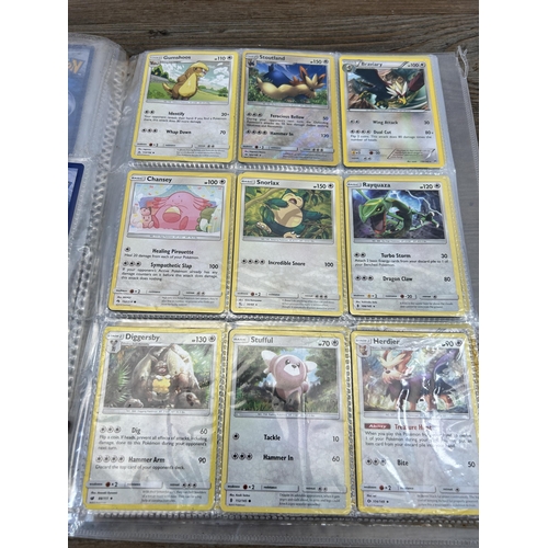 423 - A large collection of Pokémon trading cards to include two Jumbo cards, GX, EX and V cards, various ... 