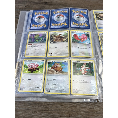 423 - A large collection of Pokémon trading cards to include two Jumbo cards, GX, EX and V cards, various ... 