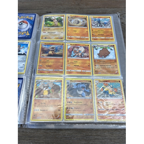 423 - A large collection of Pokémon trading cards to include two Jumbo cards, GX, EX and V cards, various ... 