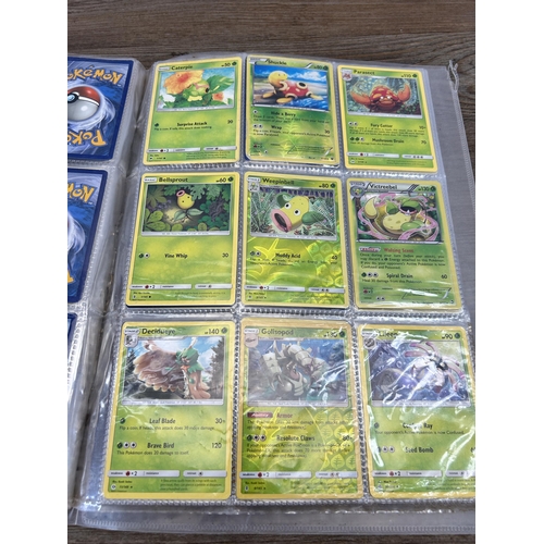 423 - A large collection of Pokémon trading cards to include two Jumbo cards, GX, EX and V cards, various ... 