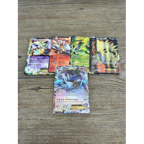 423 - A large collection of Pokémon trading cards to include two Jumbo cards, GX, EX and V cards, various ... 