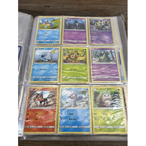 423 - A large collection of Pokémon trading cards to include two Jumbo cards, GX, EX and V cards, various ... 