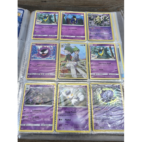 423 - A large collection of Pokémon trading cards to include two Jumbo cards, GX, EX and V cards, various ... 