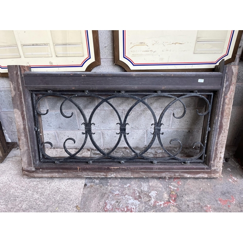 1 - A 19th century wooden and cast iron ecclesiastical window - approx. 95cm high x 167cm wide