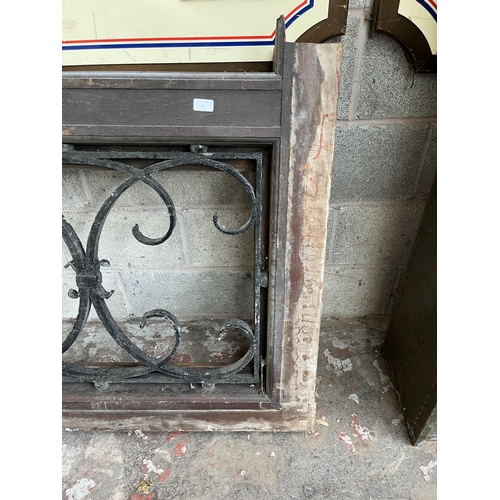 1 - A 19th century wooden and cast iron ecclesiastical window - approx. 95cm high x 167cm wide