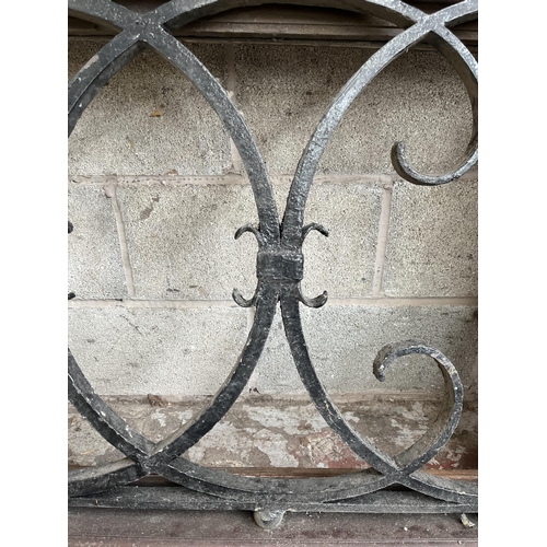 1 - A 19th century wooden and cast iron ecclesiastical window - approx. 95cm high x 167cm wide