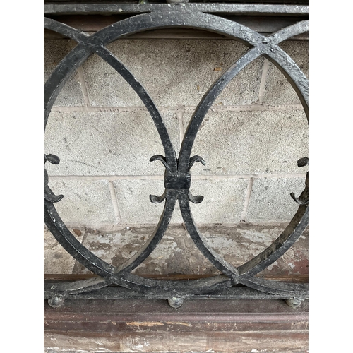 1 - A 19th century wooden and cast iron ecclesiastical window - approx. 95cm high x 167cm wide