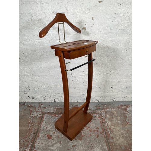 10 - A Qcesorib cherry wood valet stand