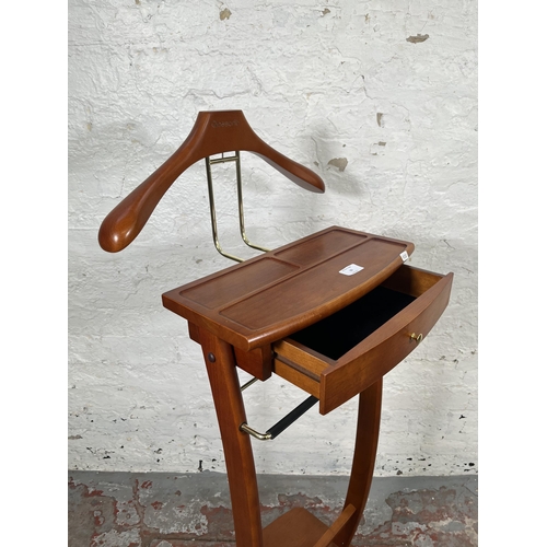 10 - A Qcesorib cherry wood valet stand