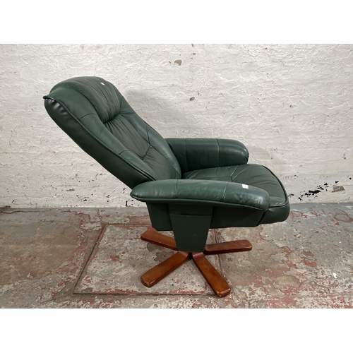 100 - A Stressless style green leather swivel reclining armchair