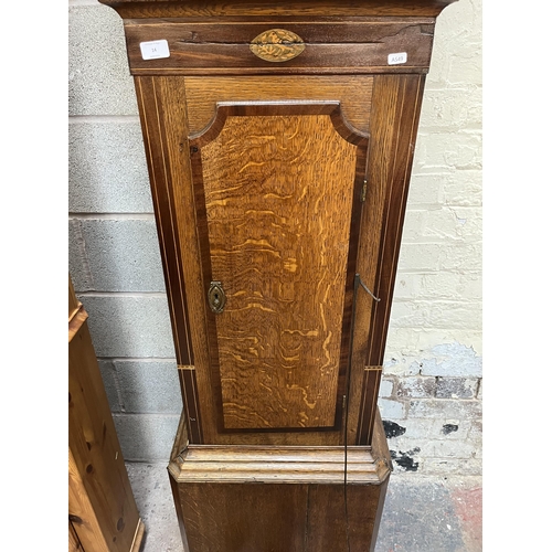 14 - A Georgian J. Wild Macclesfield inlaid mahogany and oak cased grandfather clock with hand painted en... 