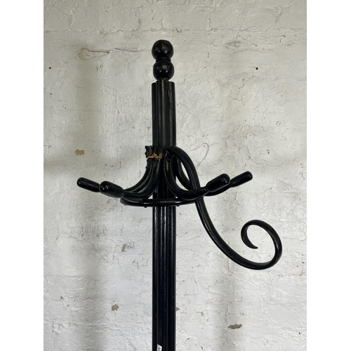 15 - A black painted bentwood coat stand