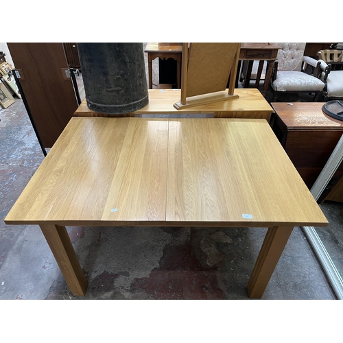 19 - A modern solid oak rectangular extending dining table - approx. 75cm high x 90cm wide x 130cm long n... 