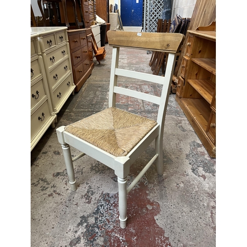 25 - A modern oak and white painted occasional chair with rush seat