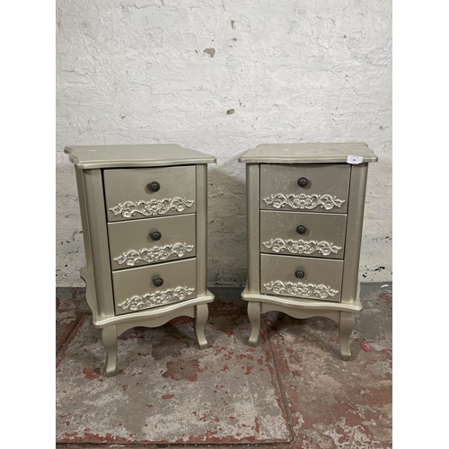 28 - A pair of French style silver painted bedside chests of three drawers