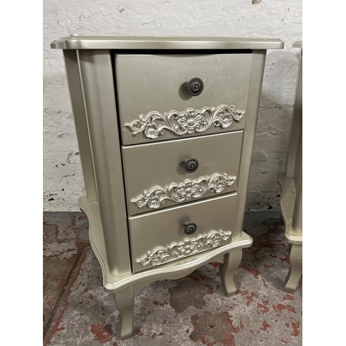 28 - A pair of French style silver painted bedside chests of three drawers